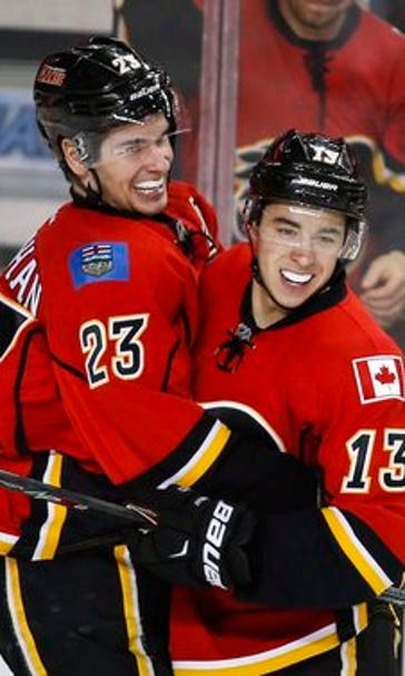 Monahan's first 4-point game powers Flames over Hurricanes